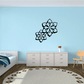 A cozy child's bedroom featuring Snowflake Decals on blue walls above a white bed