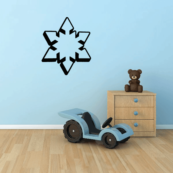 Snowflake wall sticker adorning a child's play area with a teddy bear