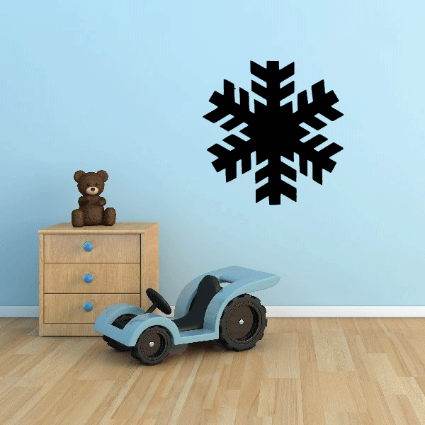 A snowflake wall embellishment in a kid's play area