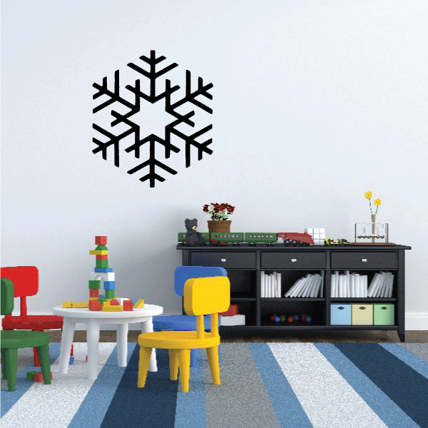 A playful snowflake decal in a youthful bedroom setting