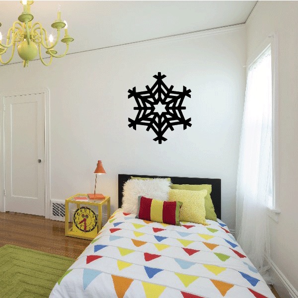 A vibrant child's room accented with a snowflake wall ornament