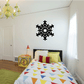 A vibrant child's room accented with a snowflake wall ornament