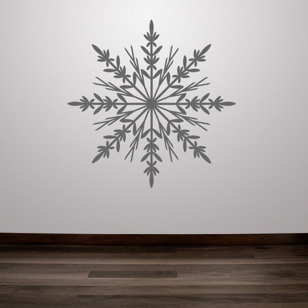 Intricate snowflake sticker adorning a home wall