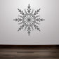 Intricate snowflake sticker adorning a home wall