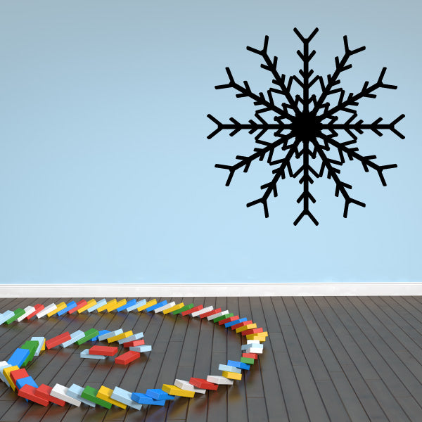 A room embellished with wooden blocks and a Snowflake Wall Decal