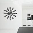 Decorative snowflake sticker on a wall in a star pattern