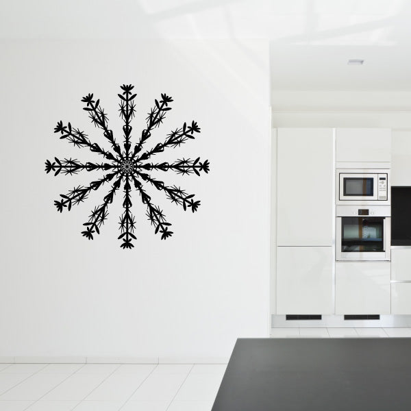 Decorative snowflake sticker on a wall in a star pattern