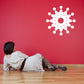 Snowflake wall decal in a room with red accents