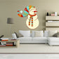 Snowman wall sticker with long patterned hat and scarf, colorful beak and red accents