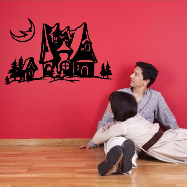 Black silhouette snowy cabin night wall decal with moon, trees, and stars