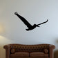 Soaring pelican wall decal, black bird silhouette in flight.