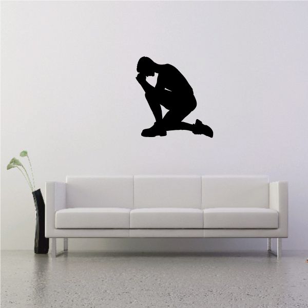 Kneeling soccer player praying wall decal, black silhouette