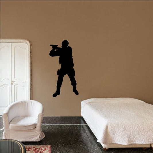 Image of Soldier Aiming Handgun Decal