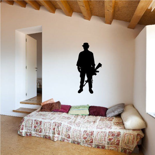 Image of Soldier Holding Gun Decal