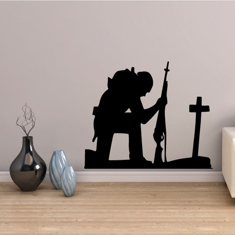 Image of Soldier Holding Rifle Praying Decal