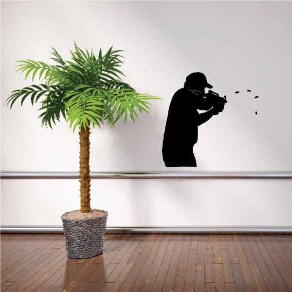 Soldier shooting decal featuring a black silhouette aiming a rifle