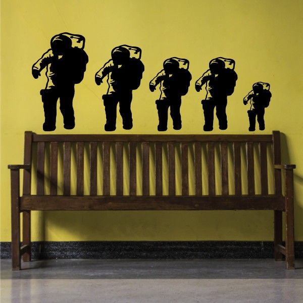 Astronaut family decal set with five black spaceman silhouettes