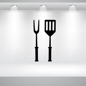 Kitchen utensil decal with fork and spatula silhouettes, black.