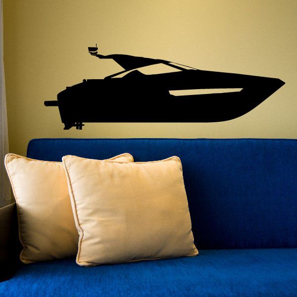 Speeding yacht decal with black silhouette, sail, and forward motion shape