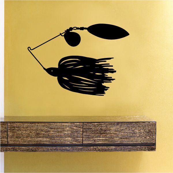 Fishing lure decal with black spinnerbait silhouette and skirt design
