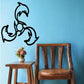 Spinning dolphin wall decal in black, circular tail and fins design