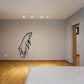 Black dolphin splash decal with emerging spray lines on wall