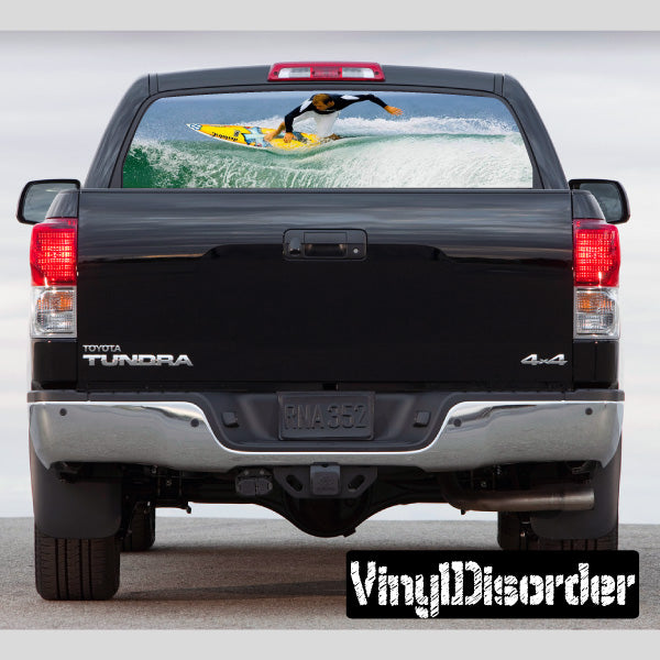 Surfing rear window graphic decal on pickup truck
