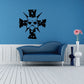 Wall decal cross with demon mask design, black with white dots