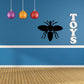 Bee decal with black spread-wing bee and TOYS letters