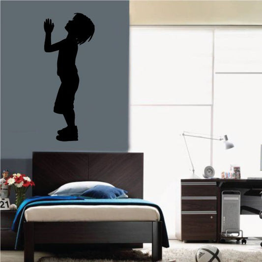 Image of Standing Boy Praying to the Sky Decal