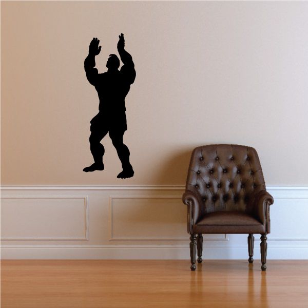 Praying muscular man wall decal silhouette, standing with hands raised