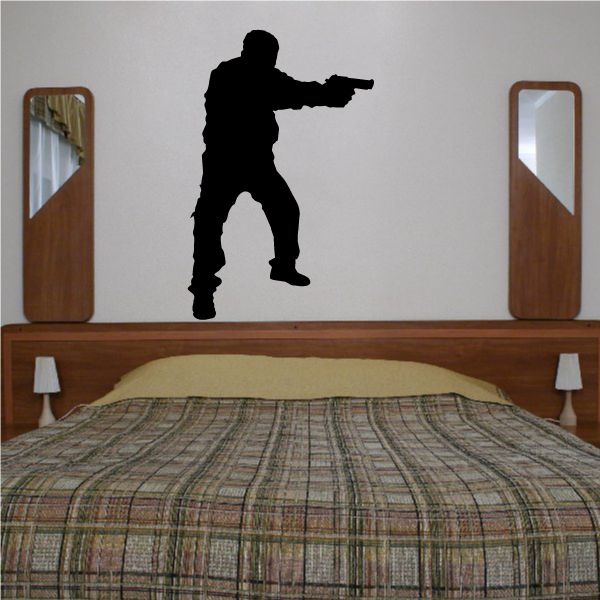 Image of Standing Soldier Pointing Handgun Decal