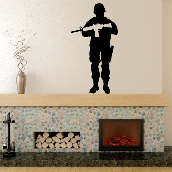 Black standing soldier decal holding a rifle, full-body silhouette