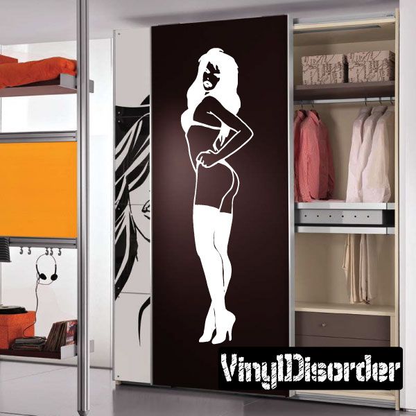 Pinup decal of a standing woman in lingerie and thigh-high stockings, monochrome silhouette