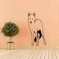Staring arctic wolf wall decal, black line art of standing wolf with front paws