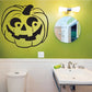 Jack-o-lantern decal with bold black pumpkin face, curved eyes and toothy grin