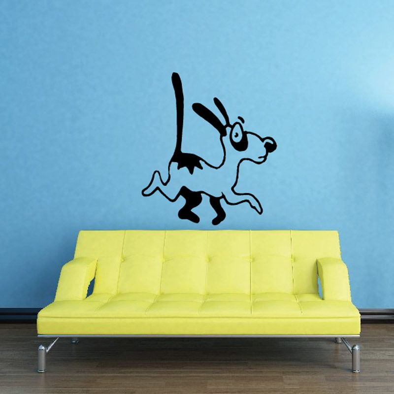 Black startled dog decal with white outline, pawed and leaping
