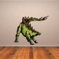 Green stegosaurus attack sticker with spiky back and open mouth