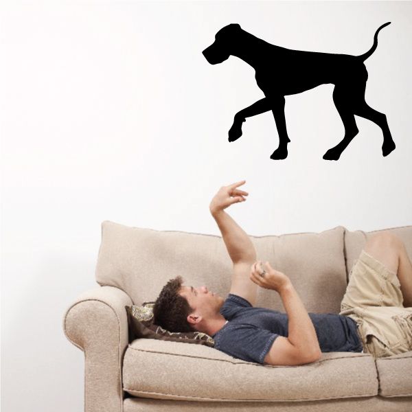 Stepping Great Dane decal, black silhouette of dog standing on paw