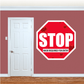 Red octagon stop sign mask required for entry sticker with white lettering