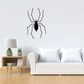 Straggly spider decal with black silhouette and web-like legs outline