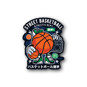 Vinyl basketball sticker with orange ball, green shoes, and Street Basketball badge design