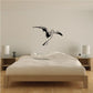 Shore bird wall decal with wings outstretched in black