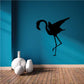 Black flamingo stretching silhouette wall decal with long legs and wings spread