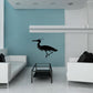 Egret wall decal of a black bird in mid-stride