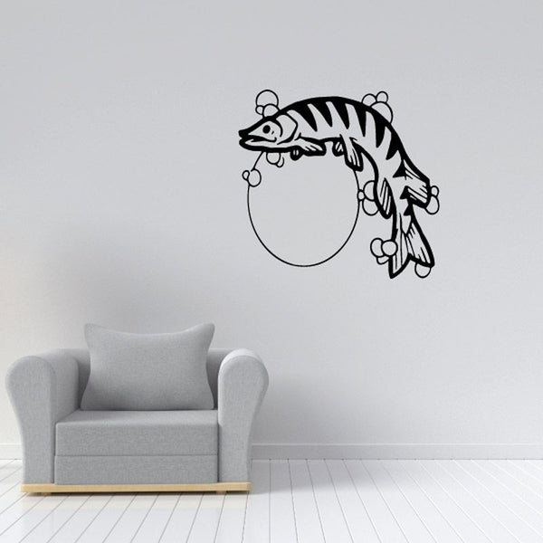 Wall decal of a striped fish with a moon-shaped circle outline
