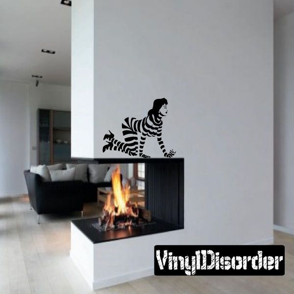 Black-and-white striped crawling woman wall decal