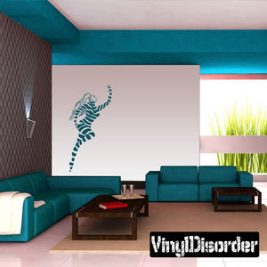 Striped jumping dancer wall decal, teal and white, black outline