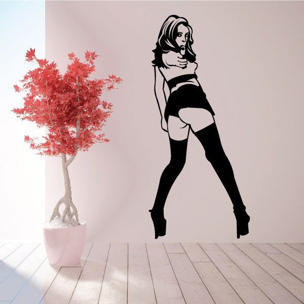 Black silhouette woman pointing gun wall decal