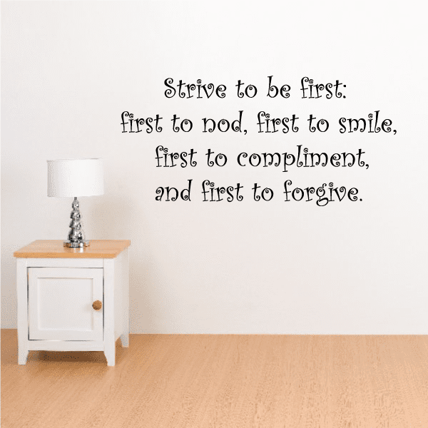 Wall decal with dark script text: Strive to be first